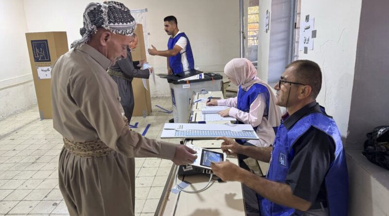 A man registers to vote during parliamentary elections in Iraq's autonomous Kurdish region of Irbil on Sunday.